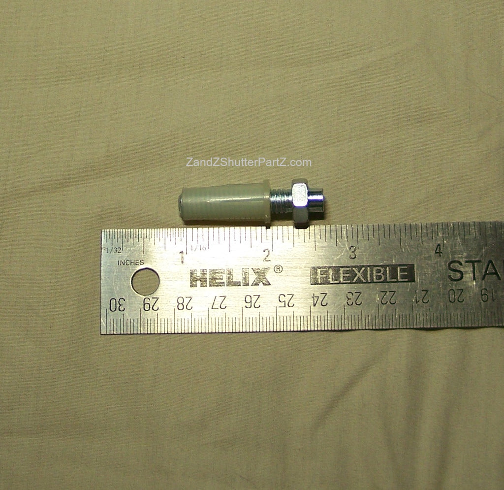 Adjustable Nylon Bottom Pivot shown next to a ruler. Use for Bi-Fold & Bypass Plantation Shutters - Shutter Track Hardware