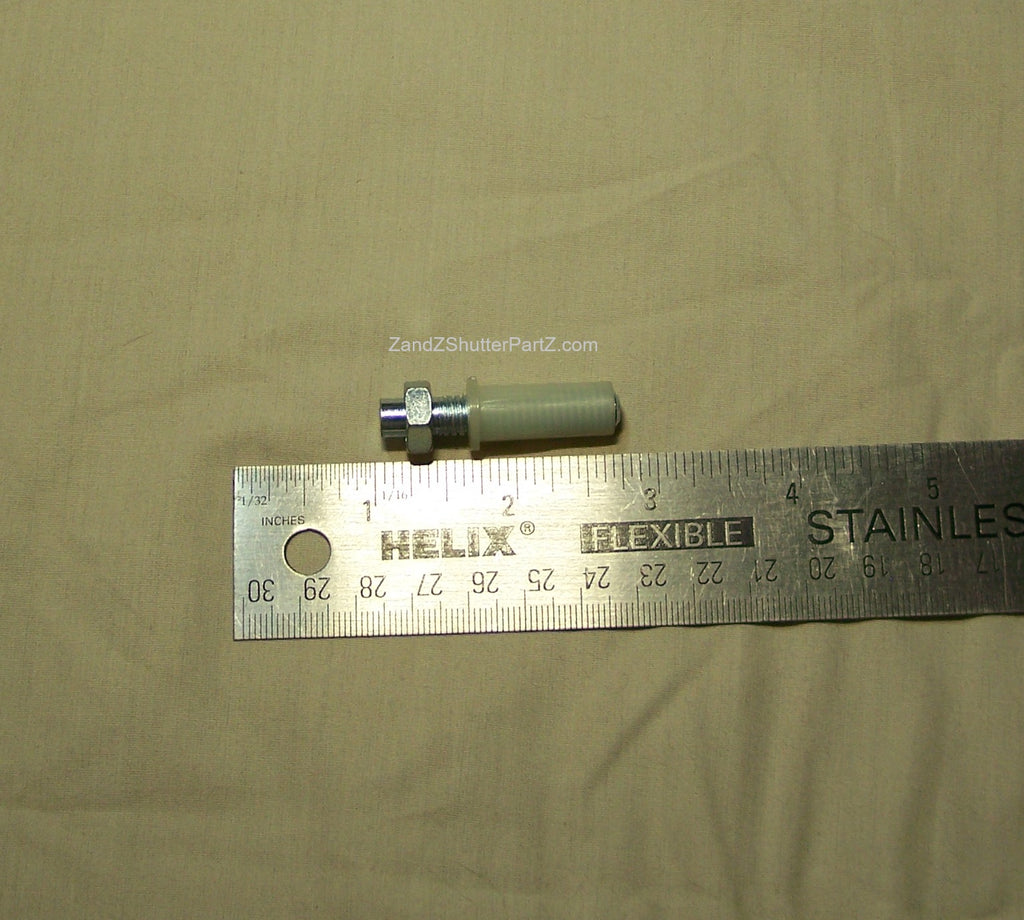 Adjustable Nylon Bottom Pivot for Bi-Fold & Bypass Plantation Shutters shown next to a ruler- Shutter Track Hardware