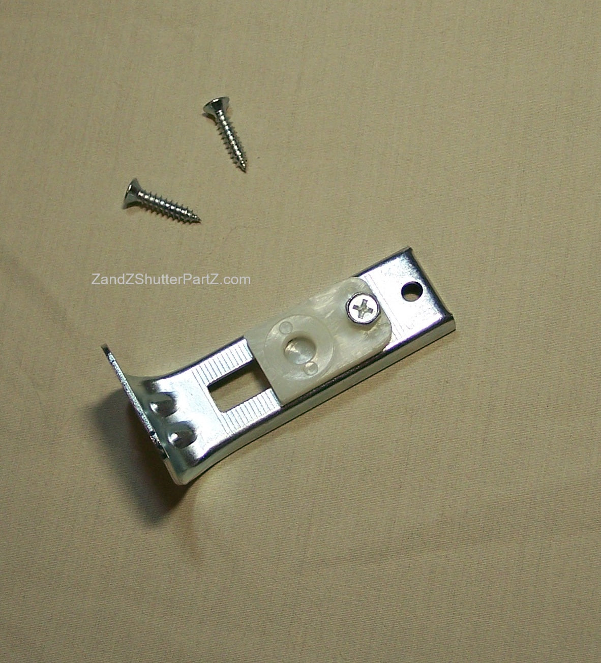 Floor Jamb Bracket for by-fold and bypass plantation shutters.