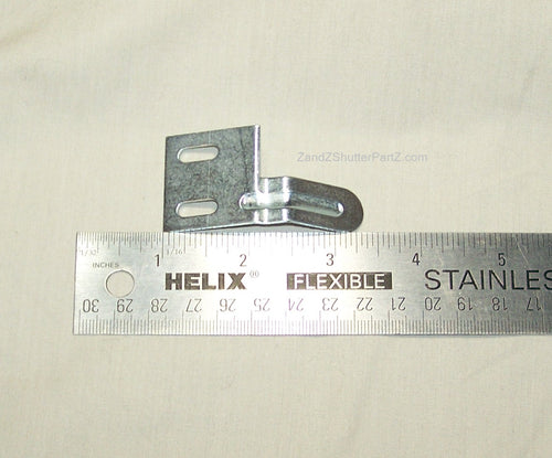 Plantation Shutter Aligner for some by-pass and bi-fold shutters shown next to ruler.